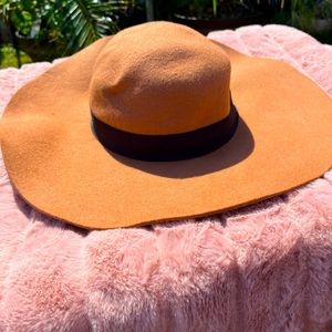 Tan panama style wide brim hat